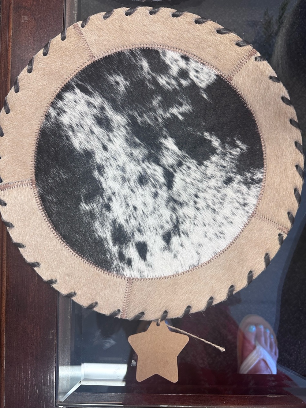 12 inch Round Cowhide and Leather Accent Mat - Black & White with Tan Trim